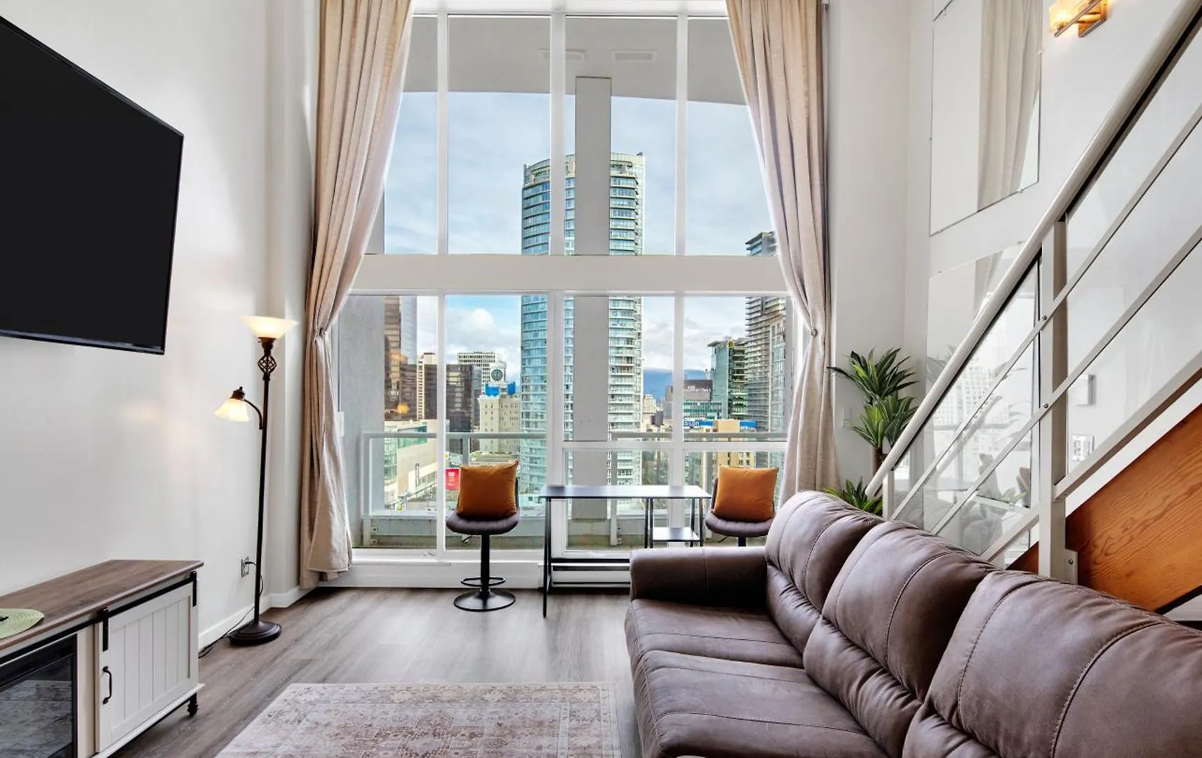 Two-Story Loft With A High-Rises View And Rooftop Deck Vancouver Apartment